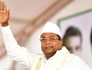 Siddaramaiah dares Modi, Yeddyurappa for an open debate in newspaper ad